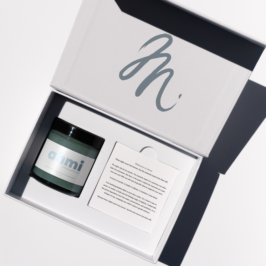 Ahmi jar in a branded box with a card on a white background