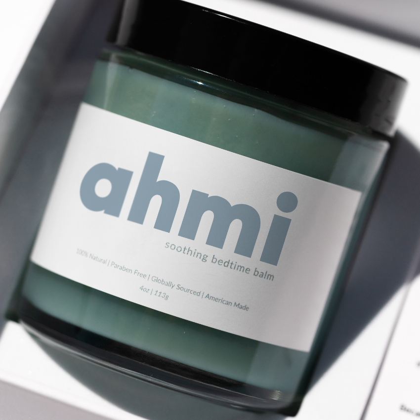 Jar of ahmi soothing bedtime balm on a white background