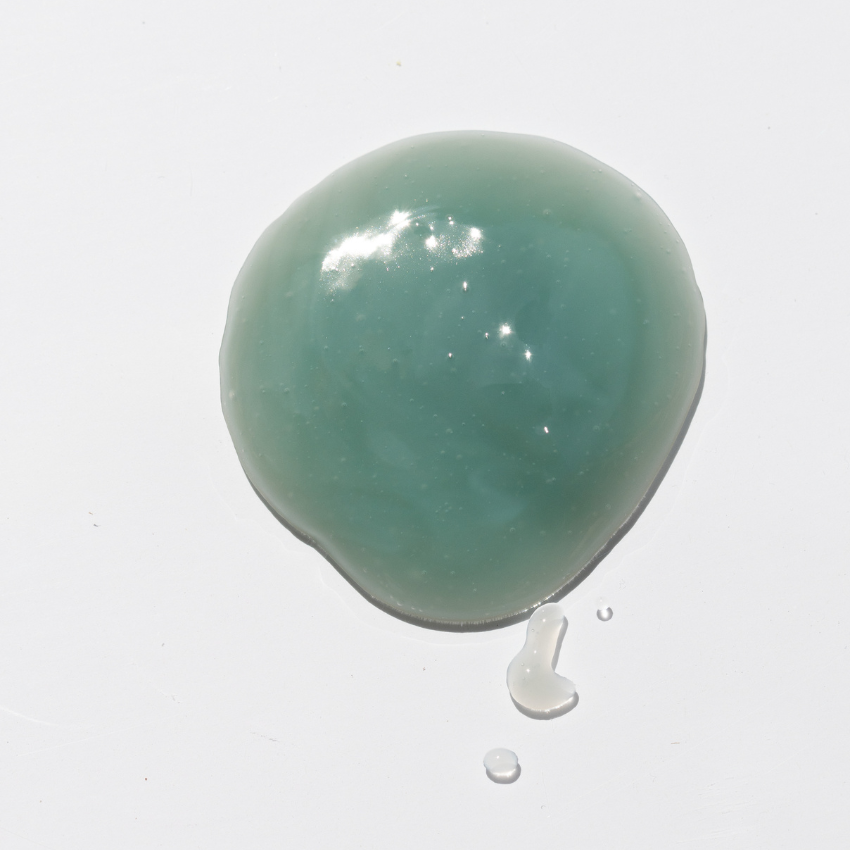 Ahmi balm blob on white background.
