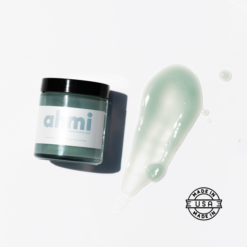 Jar of Ahmi with a swatch on a white background